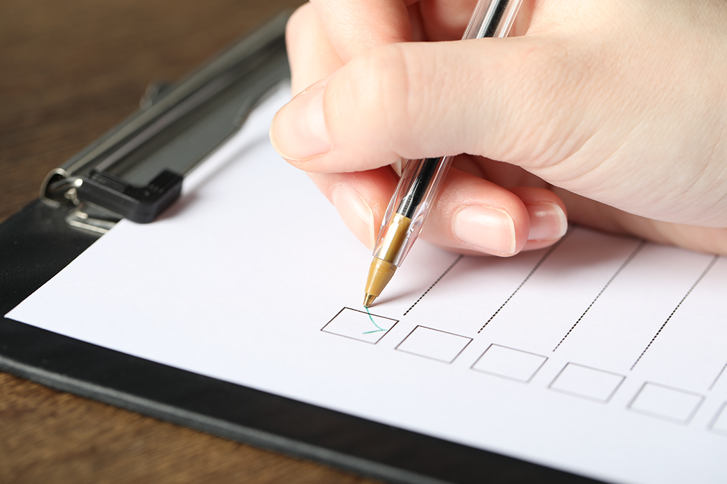 A participant filling out a Prop Card prediction form on their phone